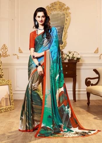 Add Some Casuals With This Pretty Saree Fabricated On Crepe. This Saree And Blouse are Beautified With prints And It Is Light Weight And Easy To Carry All Day Long