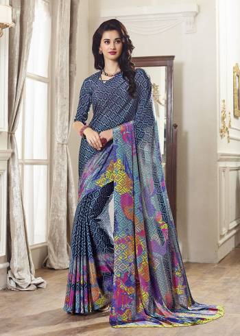 For Your Casuals Or Semi-Casuals, Grab This Light Weight Printed Saree Fabricated On Crepe. Its Fabric IS Soft Towards Skin And Ensures Superb Comfort All Day Long. Buy Now