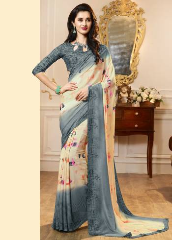 Add Some Casuals With This Pretty Saree Fabricated On Crepe. This Saree And Blouse are Beautified With prints And It Is Light Weight And Easy To Carry All Day Long