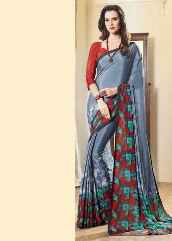 Add Some Casuals With This Pretty Saree Fabricated On Crepe. This Saree And Blouse are Beautified With prints And It Is Light Weight And Easy To Carry All Day Long