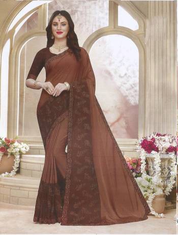 Grab This Very Pretty Designer Saree For The Upcoming Festive Season In Heavy Panel Concept. This Saree Is Fabricated On Georgette Paired With Art Silk Fabricated Blouse. It Is Light Weight, Durable And Easy To Carry All Day Long. 