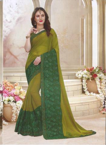 Grab This Very Pretty Designer Saree For The Upcoming Festive Season In Heavy Panel Concept. This Saree Is Fabricated On Georgette Paired With Art Silk Fabricated Blouse. It Is Light Weight, Durable And Easy To Carry All Day Long. 