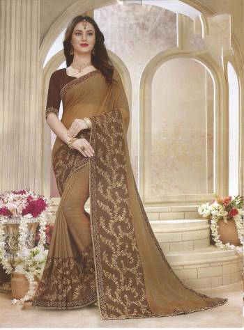 Grab This Very Pretty Designer Saree For The Upcoming Festive Season In Heavy Panel Concept. This Saree Is Fabricated On Georgette Paired With Art Silk Fabricated Blouse. It Is Light Weight, Durable And Easy To Carry All Day Long. 