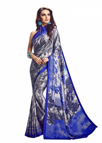 Add Some Casuals With This Pretty Saree Fabricated On Crepe. This?Saree And Blouse are Beautified With prints And It Is Light Weight And Easy To Carry All Day Long