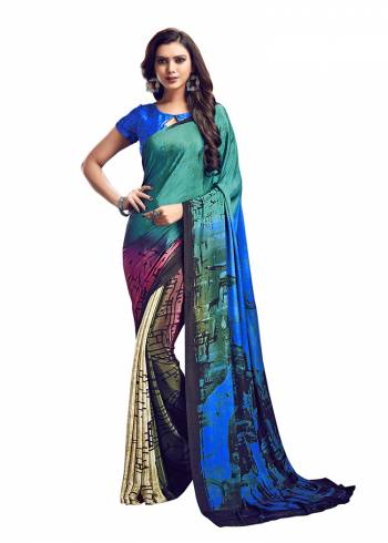 Add Some Casuals With This Pretty Saree Fabricated On Crepe. This?Saree And Blouse are Beautified With prints And It Is Light Weight And Easy To Carry All Day Long