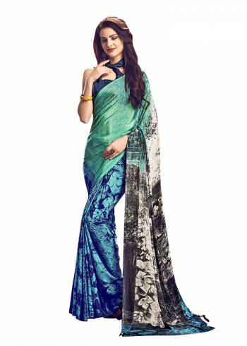 For Your Casuals Or Semi-Casuals, Grab This Light Weight Printed?Saree Fabricated On Crepe. Its Fabric IS Soft Towards Skin And Ensures Superb Comfort All Day Long. Buy Now