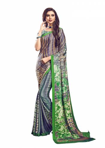 Add Some Casuals With This Pretty Saree Fabricated On Crepe. This?Saree And Blouse are Beautified With prints And It Is Light Weight And Easy To Carry All Day Long