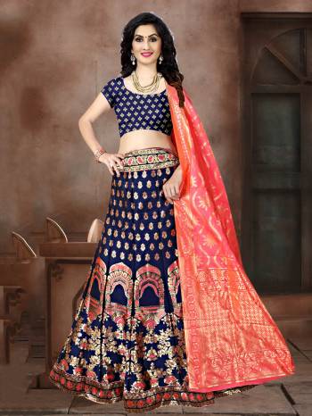 Look Pretty In This Designer Silk Based Lehenga Choli In Navy Blue Color Paired With Contrasting Fuschia Pink Colored Dupatta. It Is Fabricated On Banarasi Jacquard Silk Beautified With Weave All Over. Buy This Pretty Piece Now.