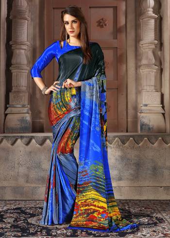 Add Some Casuals With This Pretty Saree Fabricated On Crepe. This Saree And Blouse are Beautified With prints And It Is Light Weight And Easy To Carry All Day Long