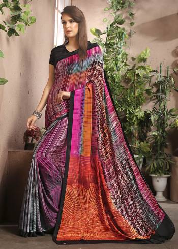 Add Some Casuals With This Pretty Saree Fabricated On Crepe. This Saree And Blouse are Beautified With prints And It Is Light Weight And Easy To Carry All Day Long