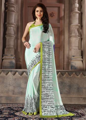 Add Some Casuals With This Pretty Saree Fabricated On Crepe. This Saree And Blouse are Beautified With prints And It Is Light Weight And Easy To Carry All Day Long