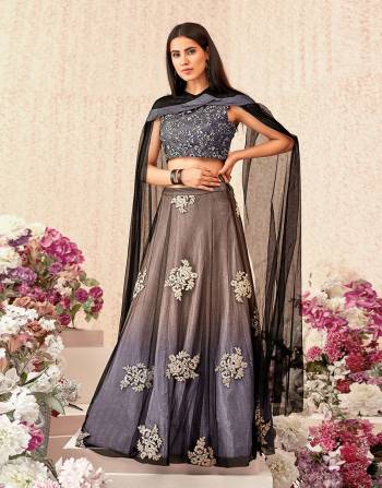 A shimmery and stylish cape sleeved lehenga in the most attarctive ombre shade will make the onlookers swoon with praise. Opt for a sleek hairdo and natural makeup to look a class apart. 