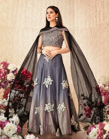 A shimmery and stylish cape sleeved lehenga in the most attarctive ombre shade will make the onlookers swoon with praise. Opt for a sleek hairdo and natural makeup to look a class apart. 