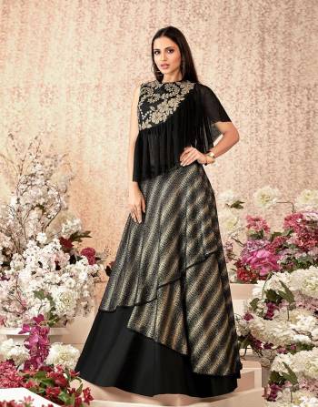 When you dream of a lehenga that's girlish , unique and at its stylish best, this design is the one for you, With a frill addition to the blouse, it makes for a wonderful pick . 