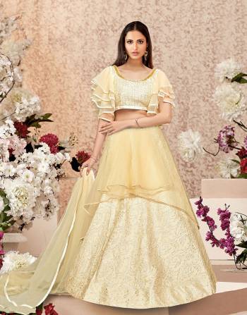 A modest pick for this festive season, this cream lehenga will make you look dreamy with its meticulous details and cuts. Pair with beautiful fashion earrings to complete the look.