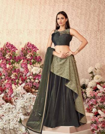 This remarkably stylish lehenga with a one-side asymmetric layer and a handwork detailed blouse is for the refined tastes. 