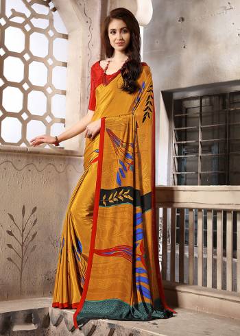 Add Some Casuals With This Pretty Saree Fabricated On Crepe. This Saree And Blouse are Beautified With prints And It Is Light Weight And Easy To Carry All Day Long