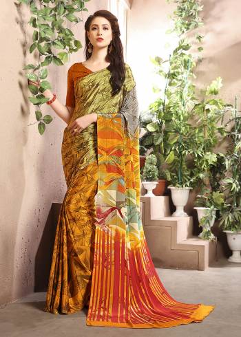 Add Some Casuals With This Pretty Saree Fabricated On Crepe. This Saree And Blouse are Beautified With prints And It Is Light Weight And Easy To Carry All Day Long