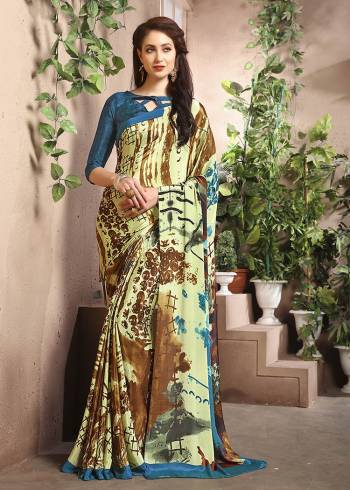 Add Some Casuals With This Pretty Saree Fabricated On Crepe. This Saree And Blouse are Beautified With prints And It Is Light Weight And Easy To Carry All Day Long