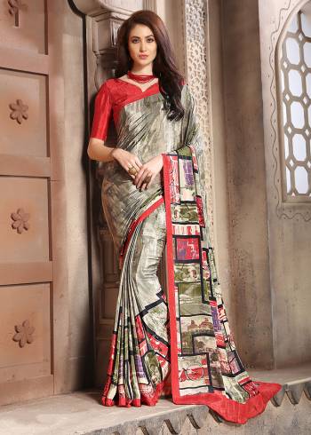 Add Some Casuals With This Pretty Saree Fabricated On Crepe. This Saree And Blouse are Beautified With prints And It Is Light Weight And Easy To Carry All Day Long