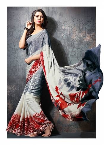 Add Some Casuals With This Pretty Saree Fabricated On Crepe. This Saree And Blouse are Beautified With prints And It Is Light Weight And Easy To Carry All Day Long?