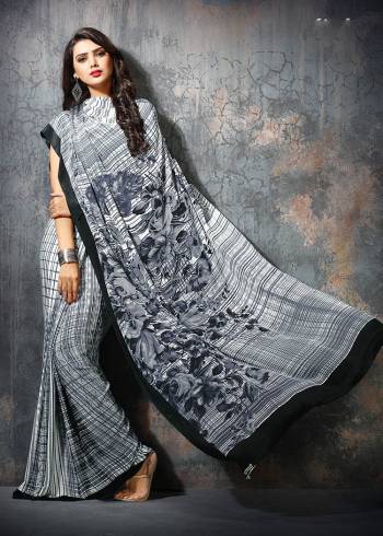 Add Some Casuals With This Pretty Saree Fabricated On Crepe. This Saree And Blouse are Beautified With prints And It Is Light Weight And Easy To Carry All Day Long?