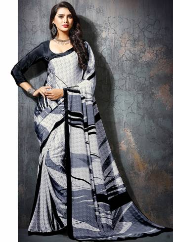 For Your Casuals Or Semi-Casuals, Grab This Light Weight Printed Saree Fabricated On Crepe. Its Fabric IS Soft Towards Skin And Ensures Superb Comfort All Day Long. Buy Now