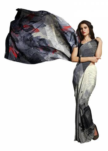 For Your Casuals Or Semi-Casuals, Grab This Light Weight Printed?Saree Fabricated On Crepe. Its Fabric IS Soft Towards Skin And Ensures Superb Comfort All Day Long. Buy Now