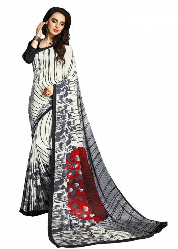 For Your Casuals Or Semi-Casuals, Grab This Light Weight Printed?Saree Fabricated On Crepe. Its Fabric IS Soft Towards Skin And Ensures Superb Comfort All Day Long. Buy Now