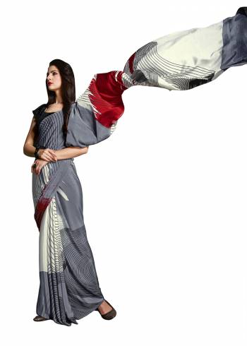 For Your Casuals Or Semi-Casuals, Grab This Light Weight Printed?Saree Fabricated On Crepe. Its Fabric IS Soft Towards Skin And Ensures Superb Comfort All Day Long. Buy Now