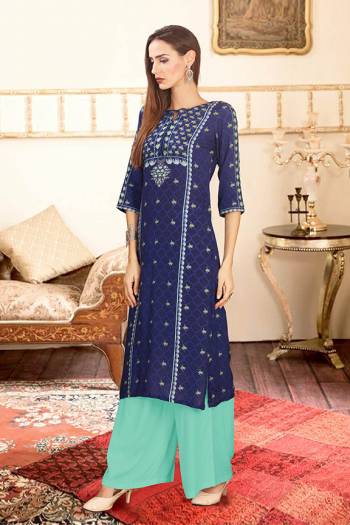 For Your Semi-Casuals, Grab This Designer Readymade Pair Of Kurti And Plazzo In Red And Turquoise Blue Color. This Pretty Pair Is Fabricated On Rayon Cotton. Its Pretty Kurti Is Beautified With Digital Prints. Buy Now.