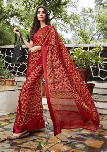 Adorn The Pretty Angelic Look Wearing This Designer Printed Saree In Red Color Paired With Red Colored Blouse. This Saree And Blouse Are Fabricated On Kota Brasso Beautified With Geometric Prints All Over. 