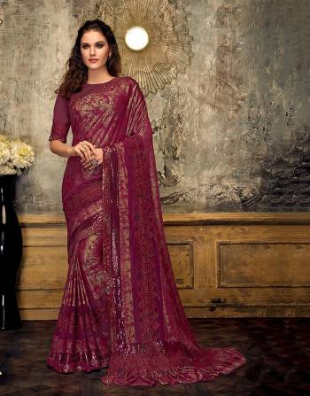 Give your ethnic wear romance a touch of glitter and glam in this stylish and modern saree. Pair with beautiful rubies and look regal. 