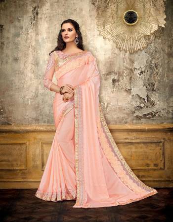 Look sensational and glorify your look this season in this very trendy Peach saree with 3d details and embellishments. Opt for subtle jewels to complete the look. 