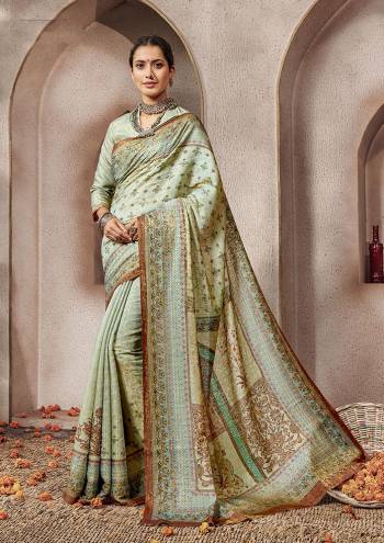 Celebrate This Festive Season Wearing This Designer Silk Based Rich Looking Saree. This Digital Printed Saree And Blouse are Fabricated On Banarasi Art Silk Which Gives A Rich Look To Your Personality. 