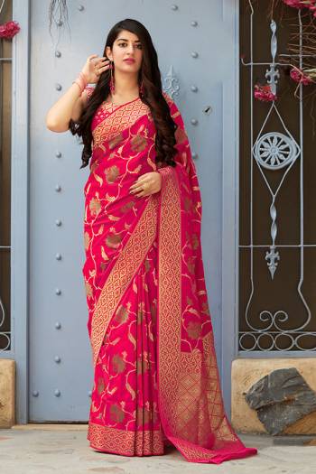 Celebrate This Festive Season With Beauty And Comfort In This Elegant Looking Designer Silk Based Saree In Rani Pink Color. This Saree And Blouse Are Fabricated On Banarasi Art Silk Beautified With Small Butti Weave All Over. Buy Now.?