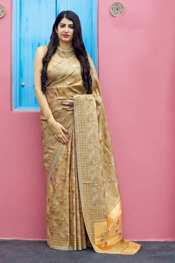 Flaunt Your Rich And Elegant Taste In Silk With This Subtle Weaved Saree In Cream Color. This Saree And Blouse Are Fabricated On Art Silk Beautified With Pretty Small Butti Weave All Over It. Its Silk Based Fabric Will Give A Rich Look To Your Personality