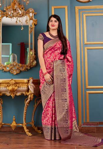 Flaunt Your Rich And Elegant Taste In Silk With This Subtle Weaved Saree In Dark Pink Color. This Saree And Blouse Are Fabricated On Banarasi Art Silk Beautified With Pretty Small Butti Weave All Over It. Its Silk Based Fabric Will Give A Rich Look To Your Personality