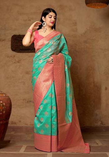 Celebrate This Festive Season With Beauty And Comfort In This Elegant Looking Designer Silk Based Saree In Sea Green Color. This Saree And Blouse Are Fabricated On Banarasi Art Silk Beautified With Small Butti Weave All Over. Buy Now.?