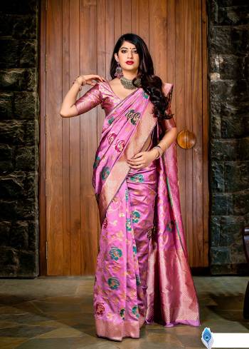 Flaunt Your Rich And Elegant Taste In Silk With This Subtle Weaved Saree In Pink Color. This Saree And Blouse Are Fabricated On Banarasi Art Silk Beautified With Pretty Small Butti Weave All Over It. Its Silk Based Fabric Will Give A Rich Look To Your Personality