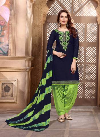 Enhance Your Personality Wearing This Designer Patiala Suit In Navy Blue Colored Top Paired With Contrasting Light Green Colored Bottom And Shaded Light Green And Navy Blue Colored Dupatta.  Buy This Pretty Suit Now.