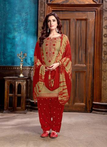 Evergreen Combination Is Here With This Designer Patiala Suit In Beige Colored Top Paired With Red Colored Bottom And Dupatta. Its Embroidered Top Is Satin Cotton Based Paired With Cotton Bottom And Chiffon Fabricated Dupatta. 