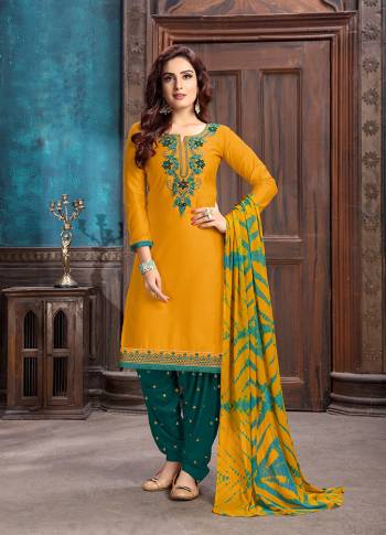 Look Beautiful In This Designer Patiala Suit In Musturd Yellow Colored Top Paired With Contrasting Teal Blue Colored Bottom And Musturd Yellow Colored Dupatta. Buy Now.