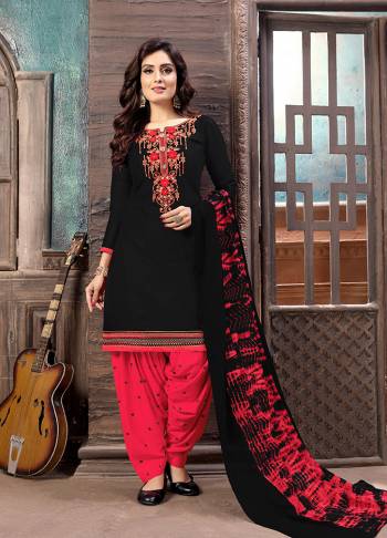 For A Bold And Beautiful Look, Grab This Very Pretty Designer Patiala Suit In Black Colored Top Paired With Black Colored Bottom And Dupatta. Its Pretty Embroidered Top Is Fabricated On Cotton Satin Paired With Cotton Bottom And Chiffon Fabricated Dupatta. 