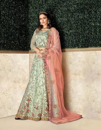 Add sweet notes of class and romance  is this gorgeous and intricately embroidered lehenga in the softest hue of blue . Drape the dupatta on your shoulders and look a class apart. 