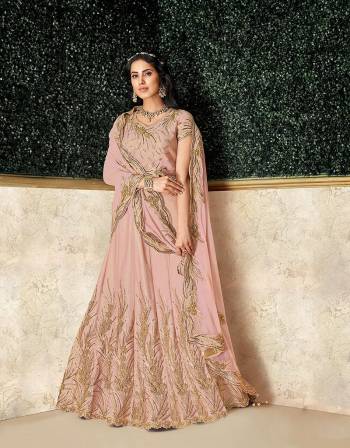 Opt for a monotone style lehenga adorned with rich golden embroidery that's subtle and outstanding and flaunt those exquisite elements like never before. 