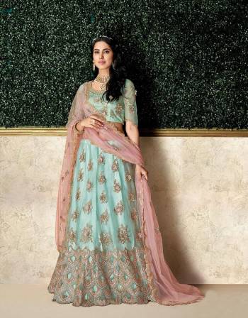 Soft, subtle and exuding a vintage finesse, the sky blue and pinkl lehenga will give an appeal of charming feminity and style. Pair with a maharani choker and steal the show. 