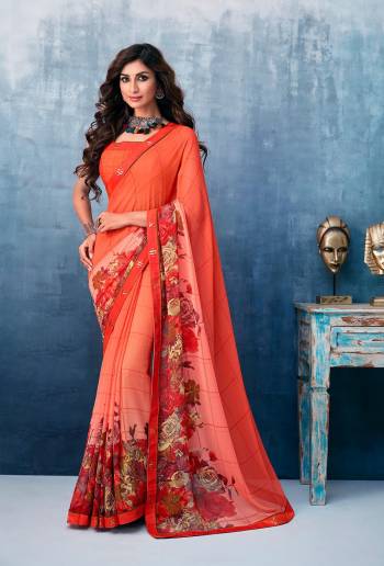 Here Is A Beautiful Printed Saree In Orange Color For the Upcoming Festive Season. This Pretty Saree Is Fabricated On Georgette Paired With Art Silk Fabricated Blouse. It Is Beautified With Prints And Lace Border. 