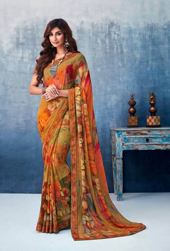 Here Is A Beautiful Printed Saree In Multi Color For the Upcoming Festive Season. This Pretty Saree Is Fabricated On Georgette Paired With Art Silk Fabricated Blouse. It Is Beautified With Prints And Lace Border. 