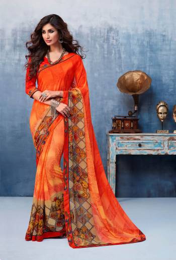 Here Is A Beautiful Printed Saree In Orange Color For the Upcoming Festive Season. This Pretty Saree Is Fabricated On Georgette Paired With Art Silk Fabricated Blouse. It Is Beautified With Prints And Lace Border. 